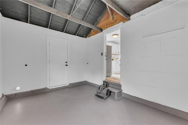 garage featuring baseboards