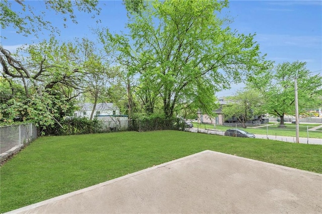 view of yard with fence and a patio area