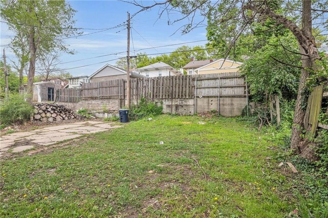 view of yard with fence