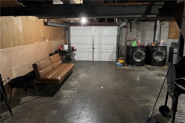garage featuring washer and dryer