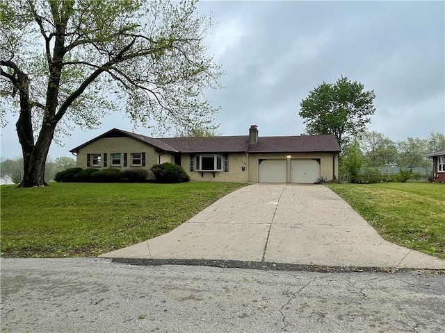 ranch-style home with concrete driveway, a chimney, a front lawn, and a garage