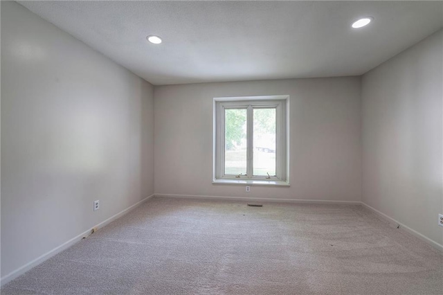 12704 Mohawk Cir, Leawood, KS 66209 - empty room featuring carpet, recessed lighting, and baseboards