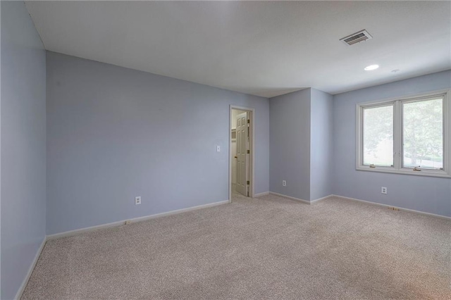 12704 Mohawk Cir, Leawood, KS 66209 - unfurnished room with light carpet and baseboards
