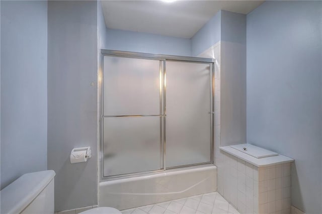 12704 Mohawk Cir, Leawood, KS 66209 - bathroom with toilet and bath / shower combo with glass door