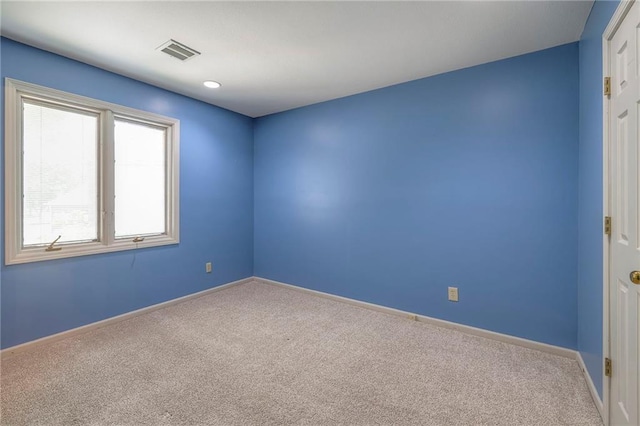 12704 Mohawk Cir, Leawood, KS 66209 - carpeted spare room with baseboards
