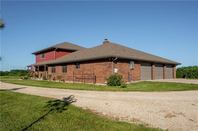205 N 1700th Rd, Lecompton, KS 66050 - view of property exterior with driveway, a chimney, a lawn, and brick siding
