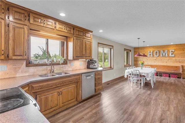 205 N 1700th Rd, Lecompton, KS 66050 - kitchen featuring stainless steel dishwasher, a sink, range with electric stovetop, wood finished floors, and backsplash