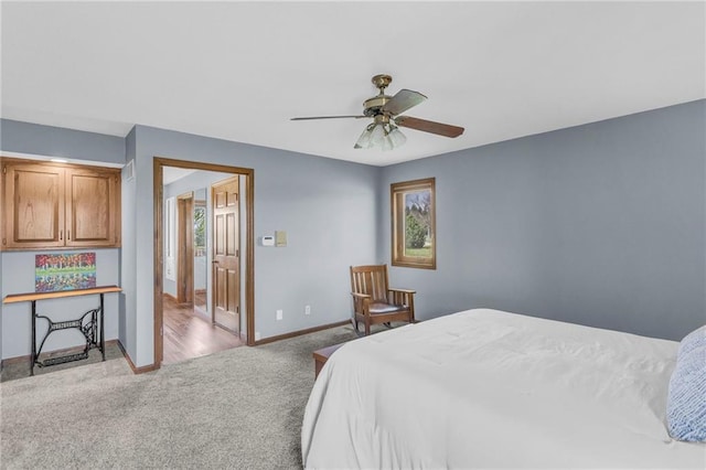 205 N 1700th Rd, Lecompton, KS 66050 - bedroom with carpet floors, baseboards, and ceiling fan