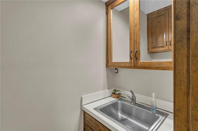 205 N 1700th Rd, Lecompton, KS 66050 - kitchen featuring a sink, brown cabinets, and light countertops