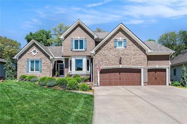 craftsman inspired home featuring brick siding, driveway, and a front yard
