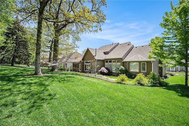 5484 NE Northgate Xing, Lees Summit, MO 64064 - back of house with a yard