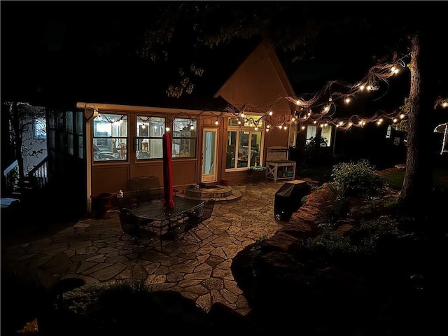 5484 NE Northgate Xing, Lees Summit, MO 64064 - patio at twilight featuring a patio