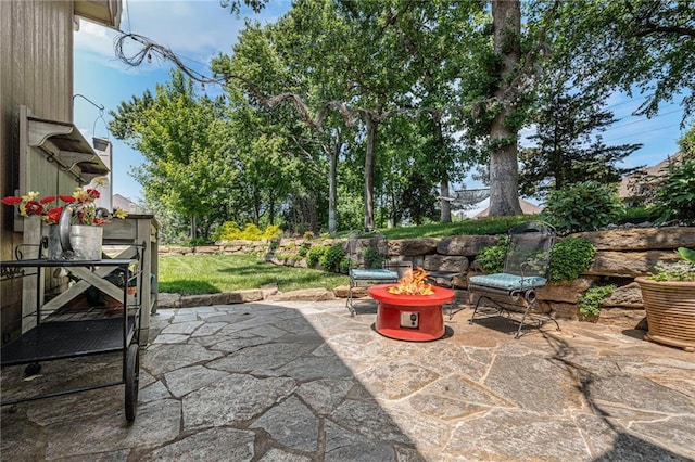 5484 NE Northgate Xing, Lees Summit, MO 64064 - view of patio / terrace featuring an outdoor fire pit