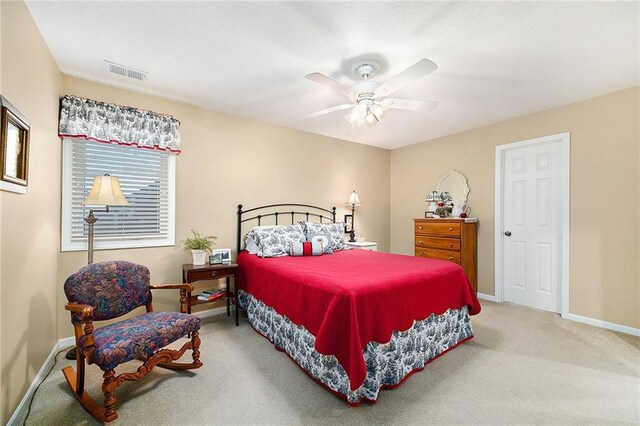 5484 NE Northgate Xing, Lees Summit, MO 64064 - carpeted bedroom with baseboards and ceiling fan