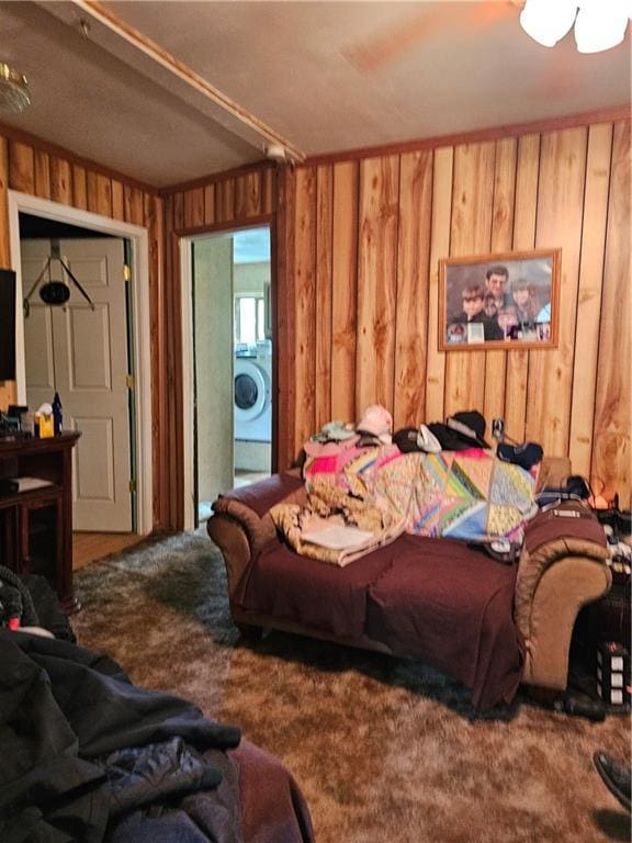 30740 W 83rd St, De Soto, KS 66018 - bedroom with wooden walls, washer / dryer, and carpet floors