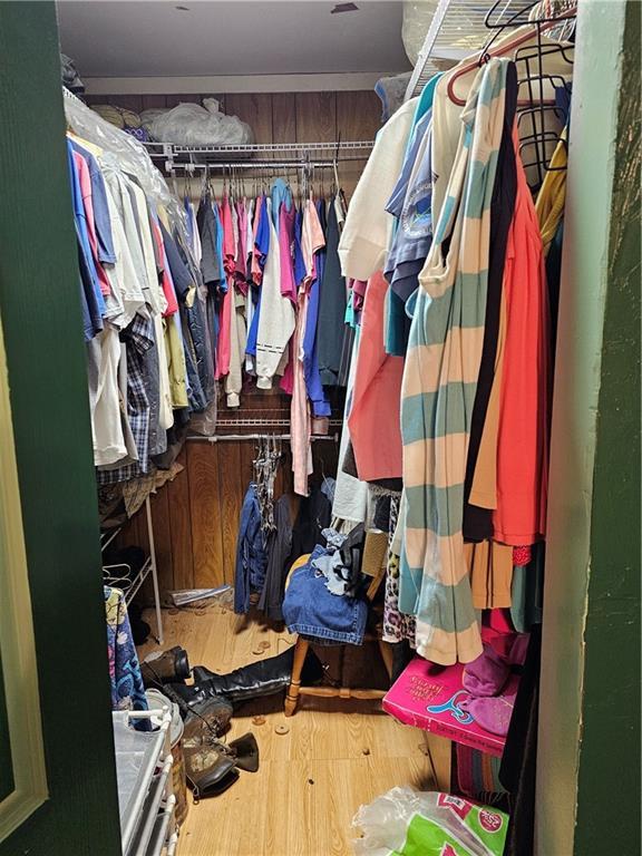 30740 W 83rd St, De Soto, KS 66018 - spacious closet featuring wood finished floors