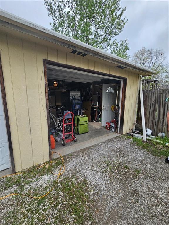 30740 W 83rd St, De Soto, KS 66018 - garage with fence