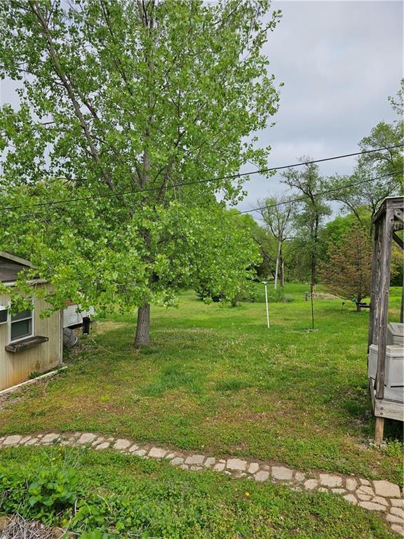30740 W 83rd St, De Soto, KS 66018 - view of yard featuring an outbuilding