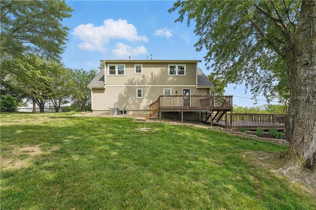 5700 N 123rd St, Kansas City, KS 66109 - rear view of house featuring stairs, a wooden deck, a lawn, central air condition unit, and a shingled roof