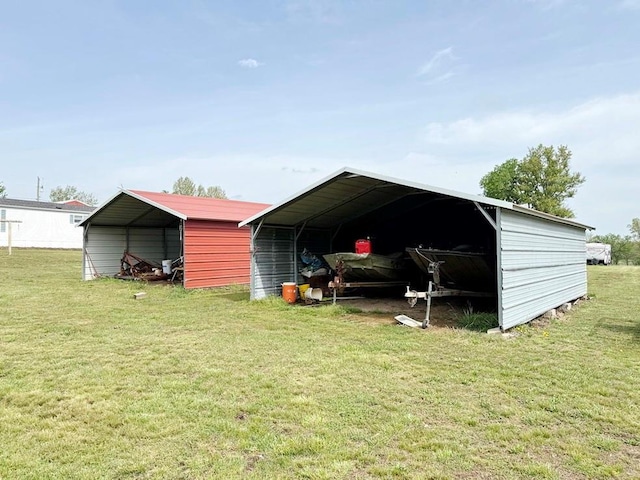 view of outdoor structure with a detached carport