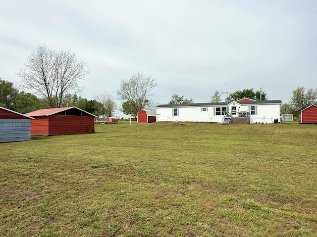 view of yard with a storage unit and an outdoor structure