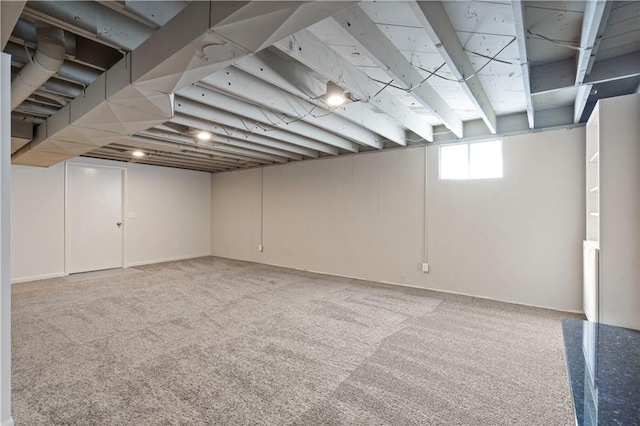 below grade area with carpet flooring