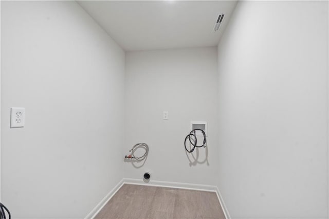 washroom featuring baseboards, laundry area, hookup for an electric dryer, and washer hookup