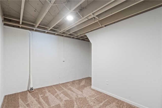 finished below grade area featuring carpet