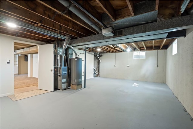 below grade area featuring gas water heater