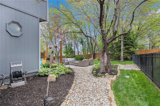 view of yard with outdoor lounge area and a patio area