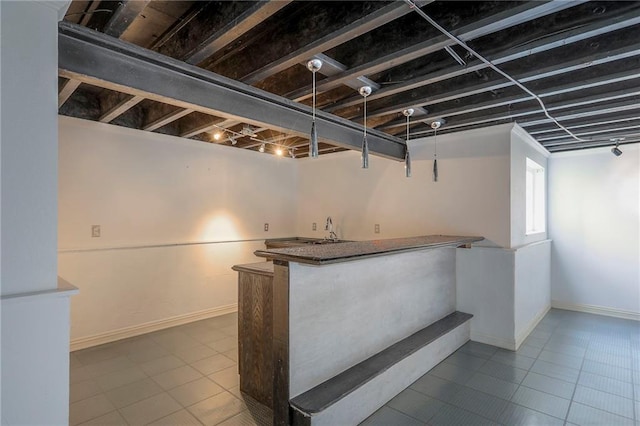 812 SW Stablewood Cir, Lees Summit, MO 64081 - basement with tile patterned floors and bar with sink