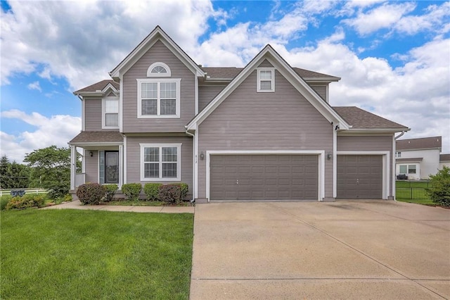812 SW Stablewood Cir, Lees Summit, MO 64081 - view of front of property featuring driveway, roof with shingles, and an attached garage