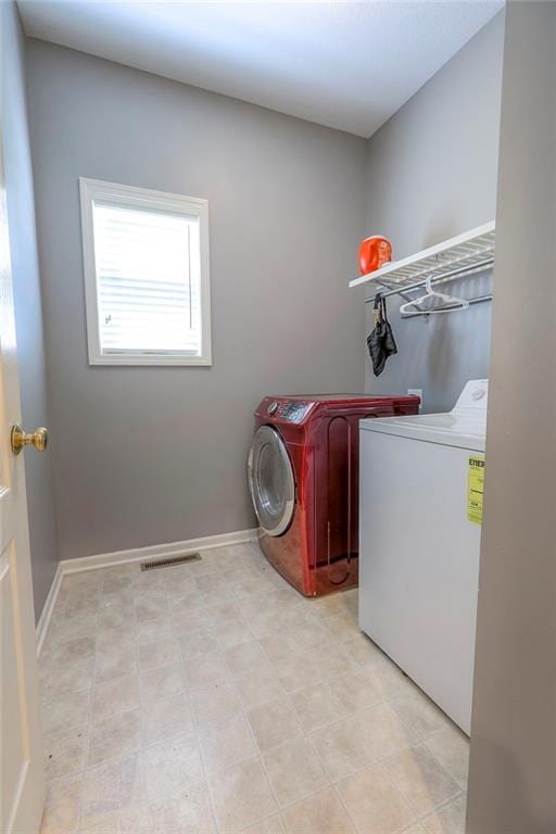 812 SW Stablewood Cir, Lees Summit, MO 64081 - laundry room featuring independent washer and dryer and baseboards