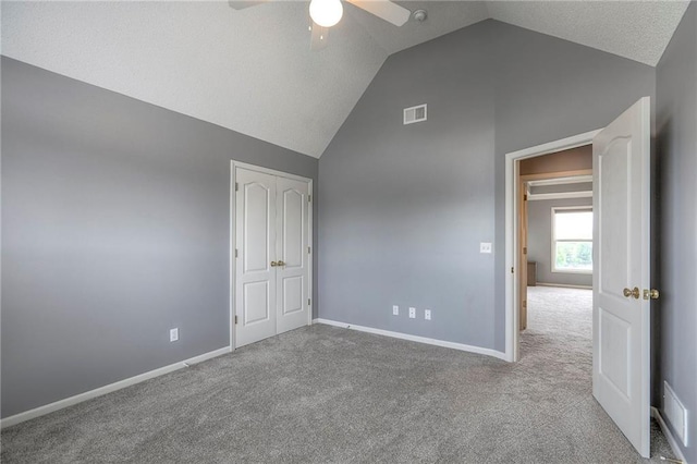 812 SW Stablewood Cir, Lees Summit, MO 64081 - unfurnished bedroom with vaulted ceiling, carpet, ceiling fan, and a closet