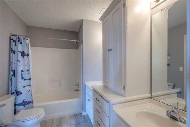 812 SW Stablewood Cir, Lees Summit, MO 64081 - full bathroom with a textured ceiling, vanity, wood finished floors, and shower / bath combination with curtain