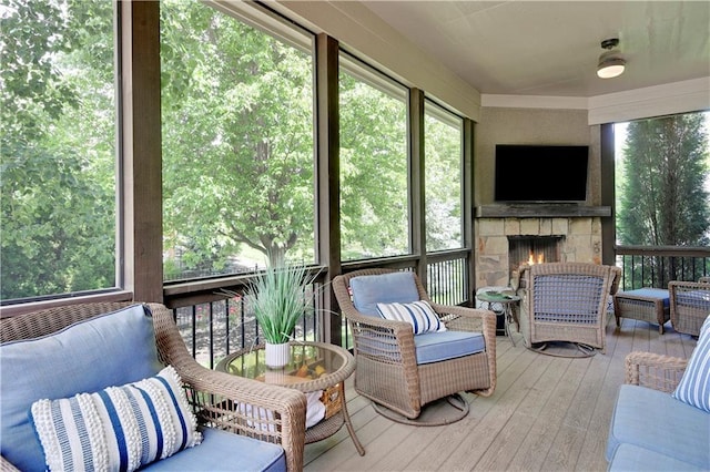 16305 Flint St, Overland Park, KS 66221 - sunroom featuring a fireplace and healthy amount of natural light