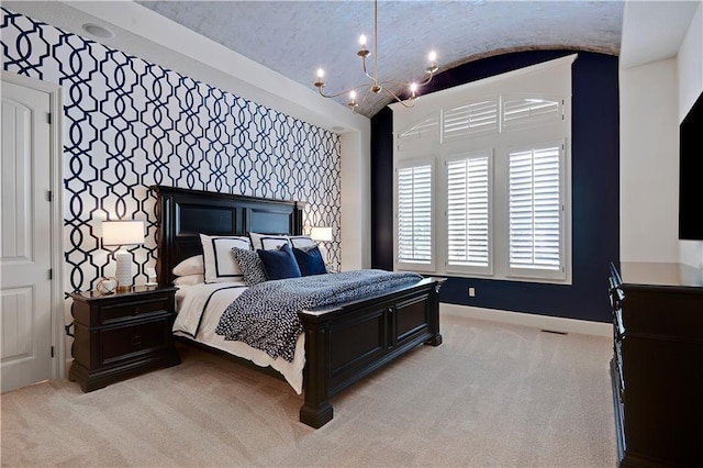 16305 Flint St, Overland Park, KS 66221 - bedroom featuring baseboards, vaulted ceiling, a chandelier, light carpet, and an accent wall