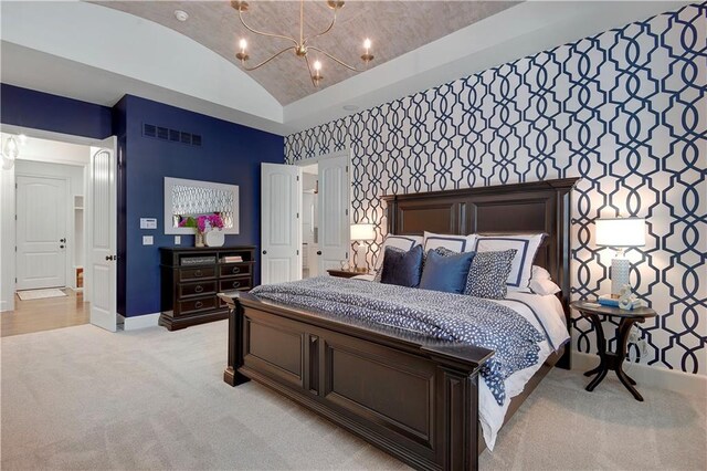 16305 Flint St, Overland Park, KS 66221 - bedroom with baseboards, lofted ceiling, light carpet, and a chandelier