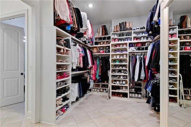 16305 Flint St, Overland Park, KS 66221 - walk in closet with tile patterned flooring