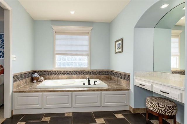 bathroom featuring a bath