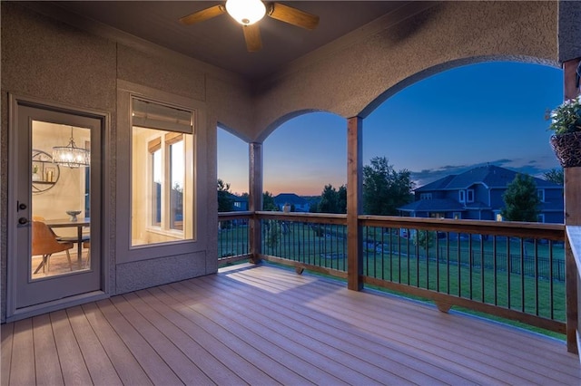 wooden deck with ceiling fan