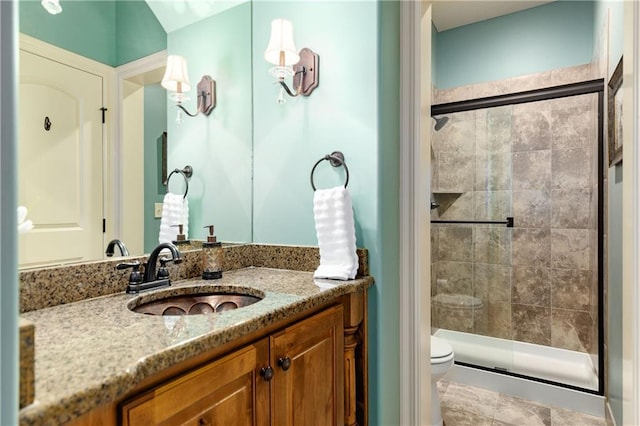 10804 W 169th St, Overland Park, KS 66221 - bathroom featuring a shower stall, vanity, and toilet