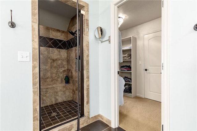 10804 W 169th St, Overland Park, KS 66221 - bathroom with a shower stall, baseboards, and a walk in closet