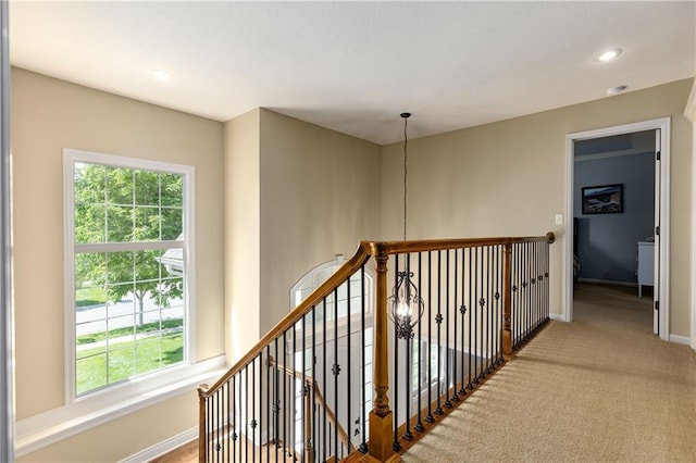 10804 W 169th St, Overland Park, KS 66221 - hallway featuring baseboards, recessed lighting, an upstairs landing, and carpet flooring