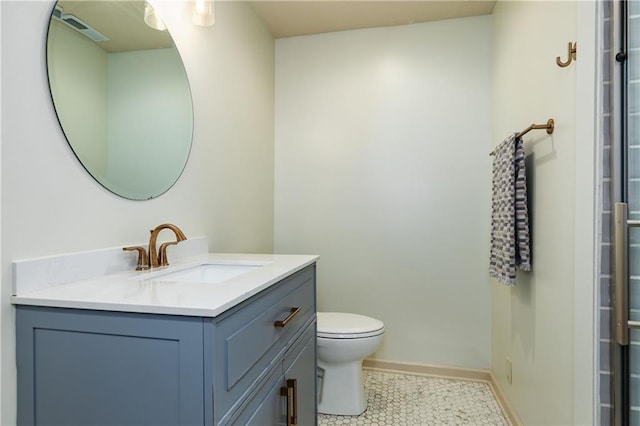 10804 W 169th St, Overland Park, KS 66221 - bathroom featuring vanity, toilet, tile patterned flooring, baseboards, and a shower with door