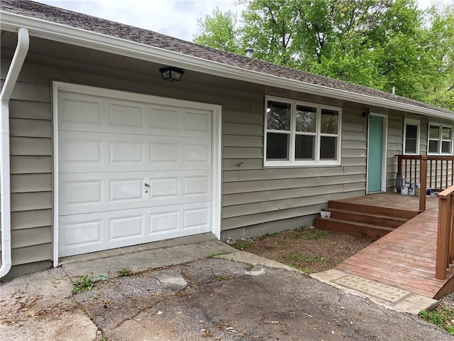 exterior space featuring driveway and an attached garage