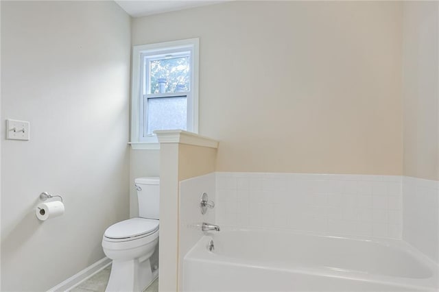 15819 W 147th Ter, Olathe, KS 66062 - full bath featuring toilet, a garden tub, baseboards, and tile patterned floors