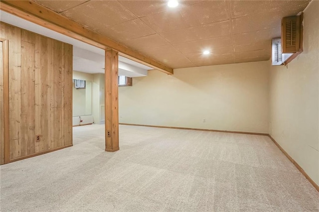 15819 W 147th Ter, Olathe, KS 66062 - below grade area with carpet floors, baseboards, wooden walls, and recessed lighting
