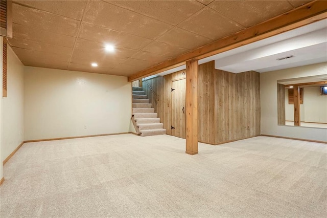 15819 W 147th Ter, Olathe, KS 66062 - finished basement with carpet flooring, baseboards, wooden walls, stairway, and recessed lighting
