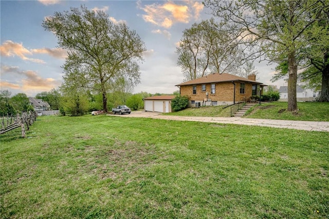 view of yard featuring a garage